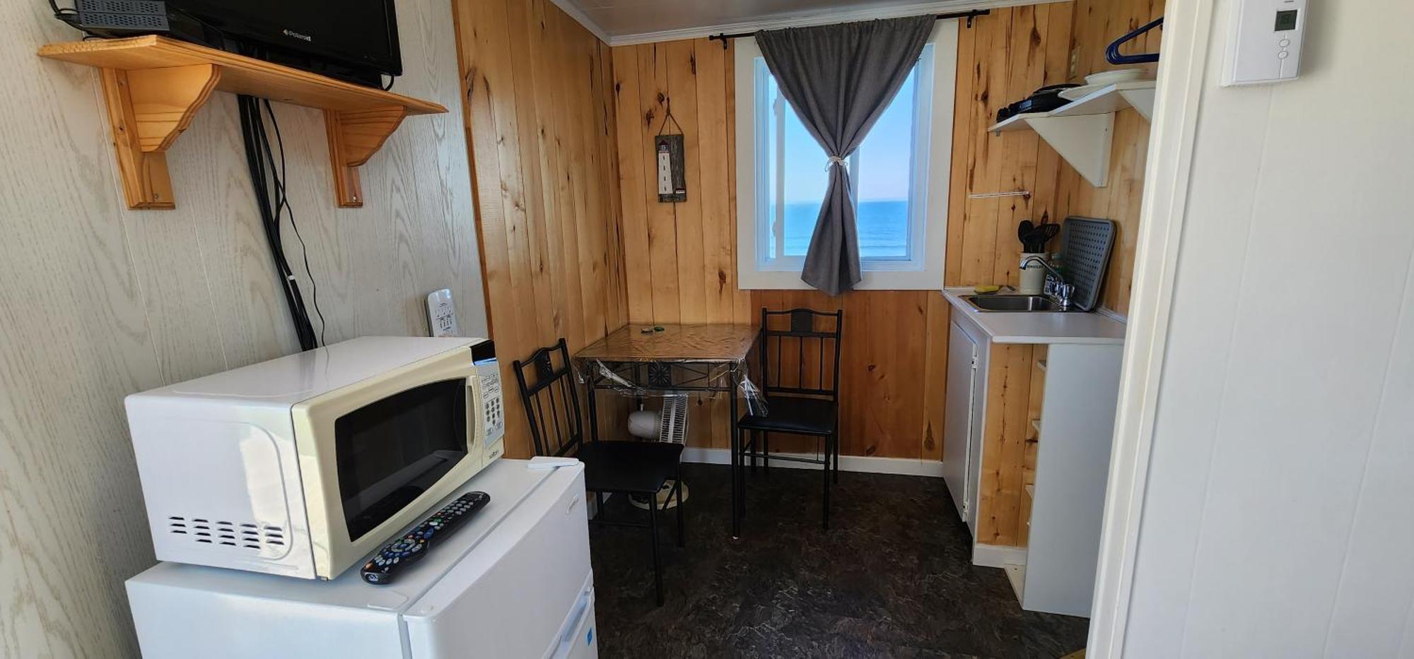 Les Cabines Sur Mer Cap-des-Rosiers Номер фото